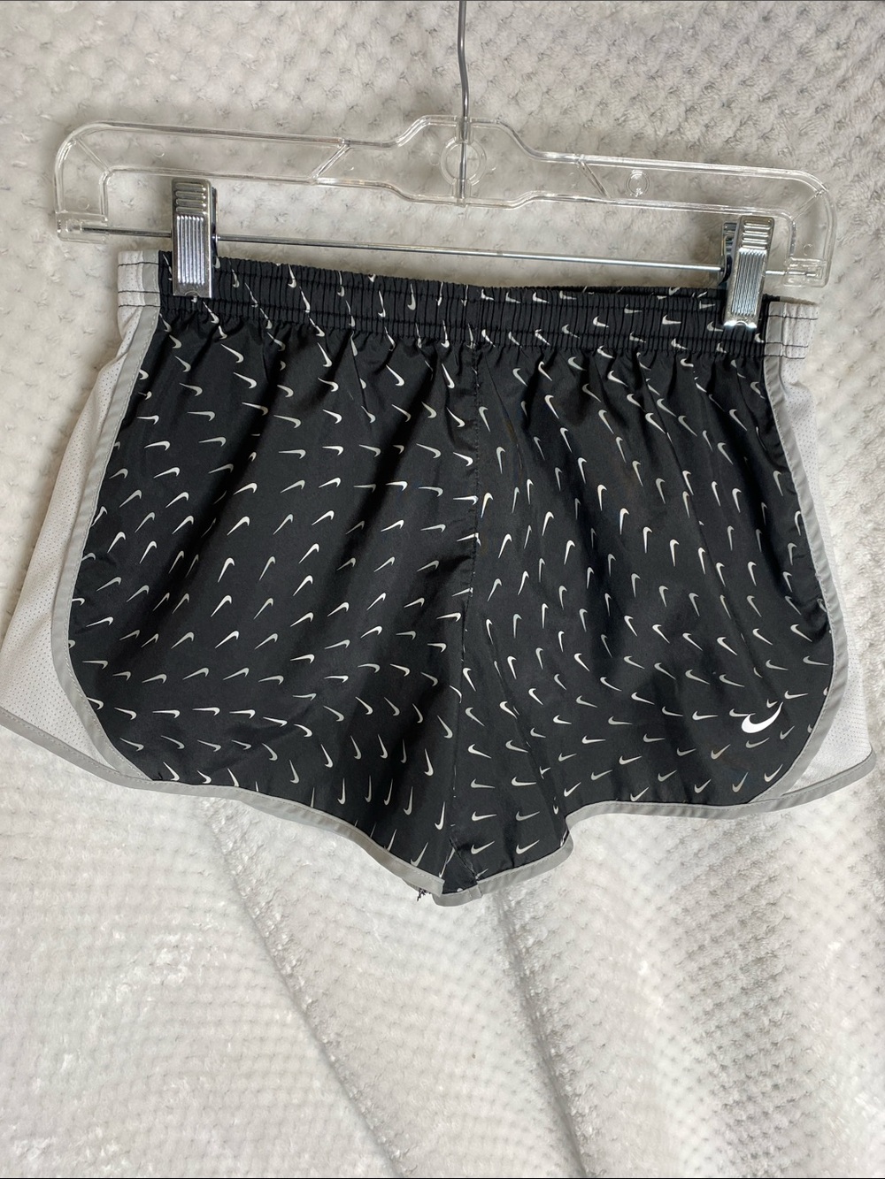 Nike Black Athletic Running Shorts with White Swoosh Print